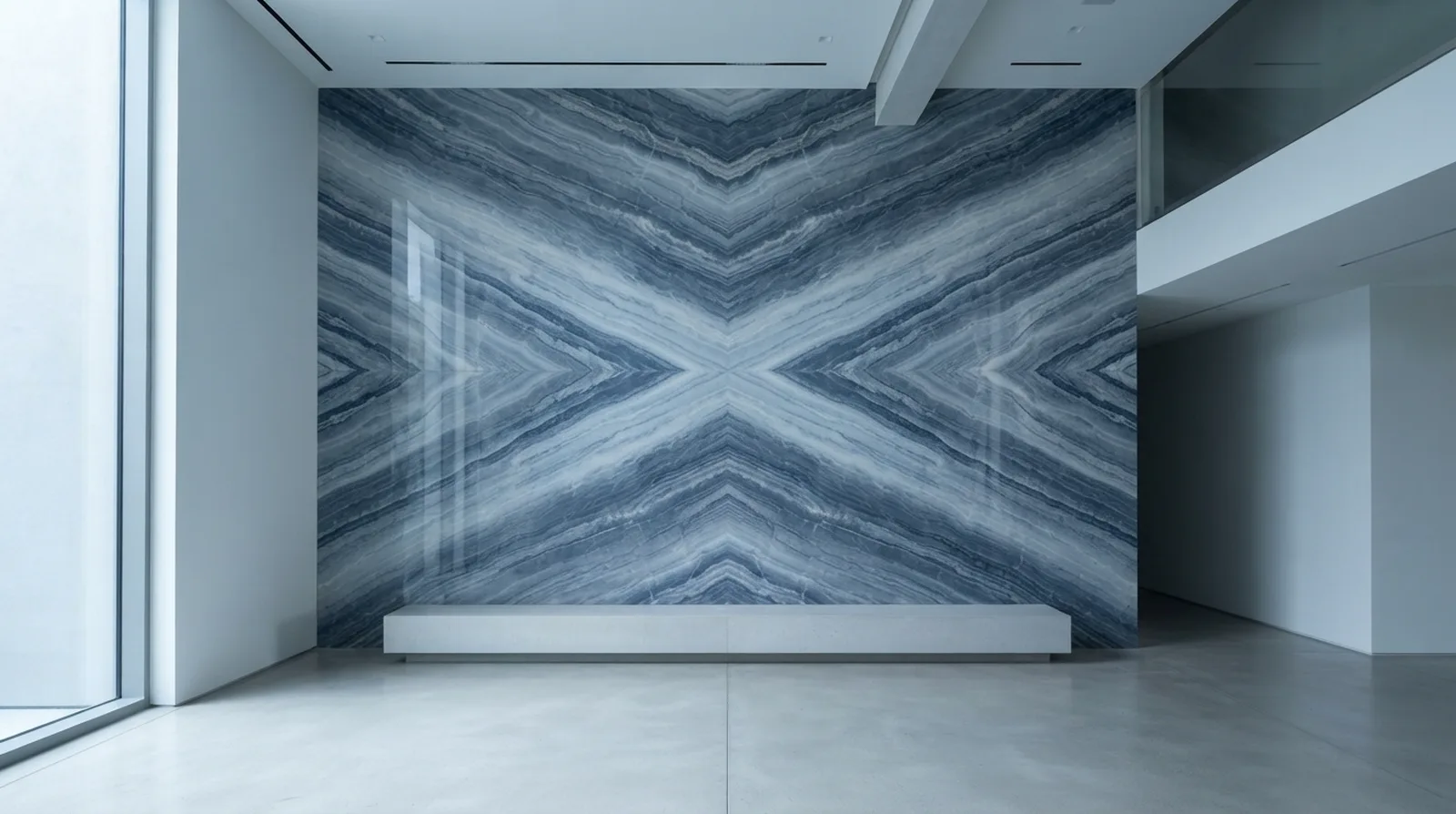 Book-matched Azul Macaubas quartzite wall forming one symmetrical butterfly pattern across four slabs